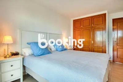 Cama o camas de una habitación en Rancho suizo Apartament per 4 persones amb vistes al mar amb piscina comunitària