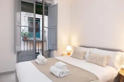 Cama o camas de una habitación en Flateli Cort Reial 10