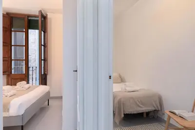 Cama o camas de una habitación en Flateli Cort Reial 10