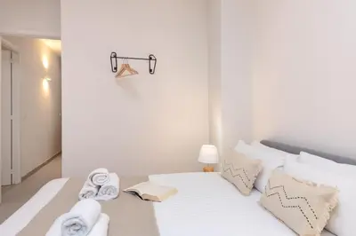 Cama o camas de una habitación en Flateli Cort Reial 10
