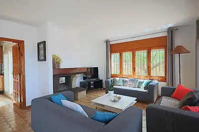 Una televisión o centro de entretenimiento en Villa Majestic