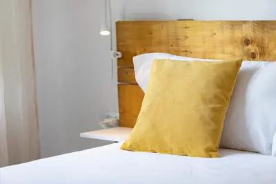 Cama o camas de una habitación en Bravissimo El Lleó, bright 4-bedroom apartment