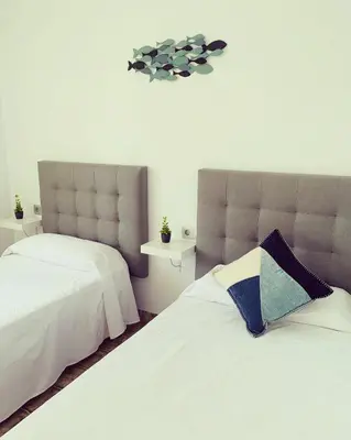 Cama o camas de una habitación en Rancho Suizo 852