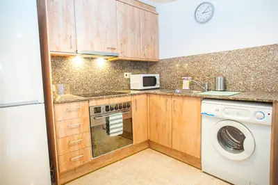 Una cocina o zona de cocina en AL29 Apartamento playa Fenals