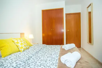 Cama o camas de una habitación en AL29 Apartamento playa Fenals