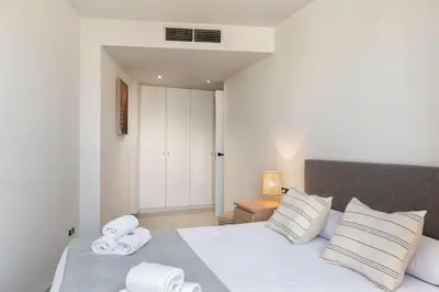 Cama o camas de una habitación en Flateli Plaça Catalunya 10