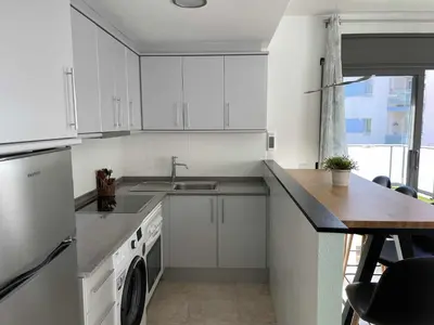 Una cocina o zona de cocina en Solàrium con terraza a 5 minutos de la playa