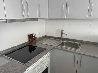 Una cocina o zona de cocina en Solàrium con terraza a 5 minutos de la playa