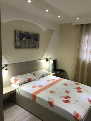 Cama o camas de una habitación en APARTMENT 2 MIN. DEL MAR