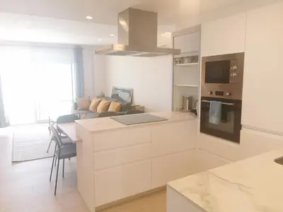 Una cocina o zona de cocina en Apartaments Primera Linea Torre Valentina