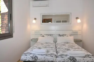 Cama o camas de una habitación en Villa Miramar Panoramic Views