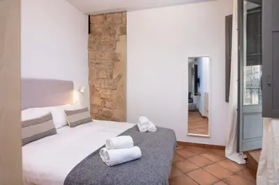 Cama o camas de una habitación en Flateli Ballesteries 26 A