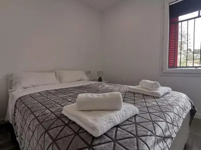 Cama o camas de una habitación en Canyelles BBQ Apartment