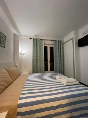 Cama o camas de una habitación en P&R hostals Maria Rosa