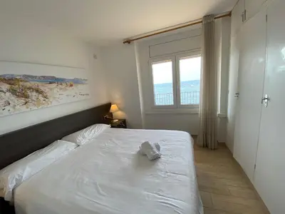 Cama o camas de una habitación en Playa Canadell MAR G primera linea de mar con terraza - WeHost Costa Brava