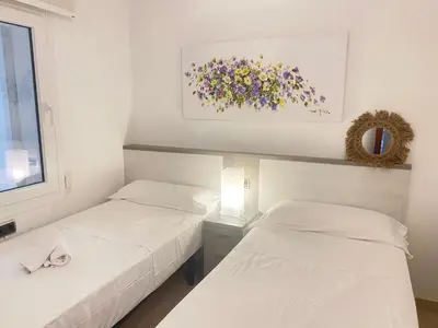 Cama o camas de una habitación en Playa Canadell MAR G primera linea de mar con terraza - WeHost Costa Brava