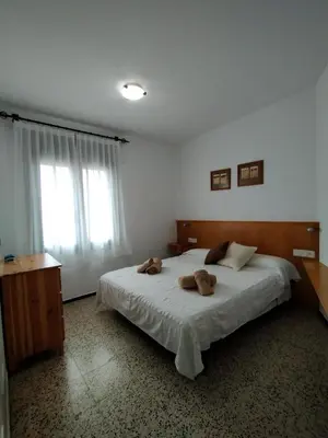 Cama o camas de una habitación en La Caseta