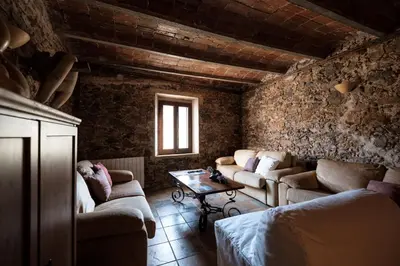 Zona de estar de Coliving Rural Els Masos d'en Coll