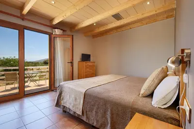 Cama o camas de una habitación en Coliving Rural Els Masos d'en Coll