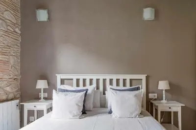 Cama o camas de una habitación en Bonaventura 4 Restored Apartment in Heart of City