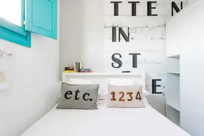 Cama o camas de una habitación en Revitalized Apartment in Historical Building