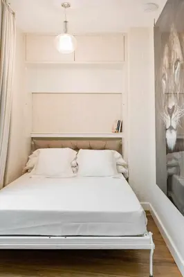 Cama o camas de una habitación en Revitalized Apartment in Historical Building