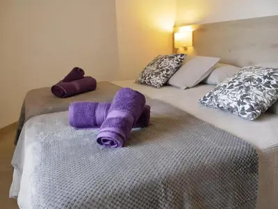 Cama o camas de una habitación en Marina Beach Apartaments - Sea views in the heart of Lloret