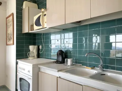 Una cocina o zona de cocina en SAN SEBASTIAN 3 D