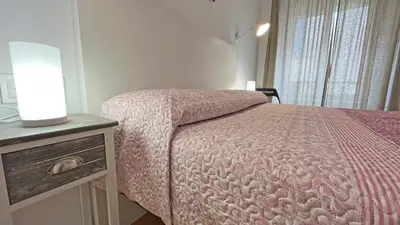 Cama o camas de una habitación en Hostal La Premsa