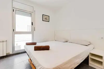 Cama o camas de una habitación en Rentalsbcn - Passeig de la Marina