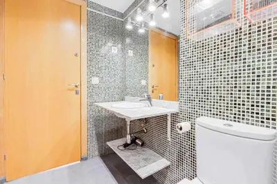 Un baño de Rentalsbcn - Passeig de la Marina