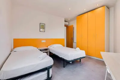 Cama o camas de una habitación en Rentalsbcn - Passeig de la Marina