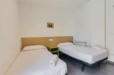 Cama o camas de una habitación en Rentalsbcn - Passeig de la Marina