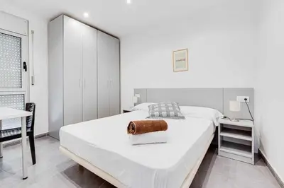 Cama o camas de una habitación en Rentalsbcn - Passeig de la Marina