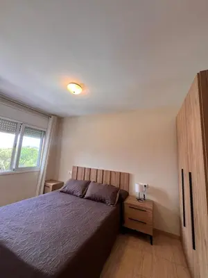 Cama o camas de una habitación en APCOSTAS Villa de Madrid