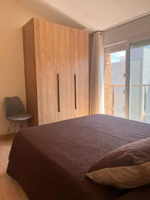 Cama o camas de una habitación en APCOSTAS Villa de Madrid