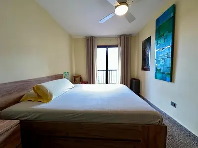 Cama o camas de una habitación en Miramar - Piso con Piscina Comunitaria con Vistas
