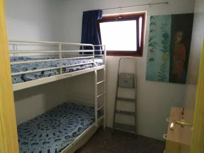 Cama o camas de una habitación en Miramar - Piso con Piscina Comunitaria con Vistas