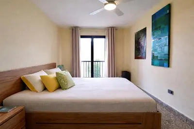 Cama o camas de una habitación en Miramar - Piso con Piscina Comunitaria con Vistas