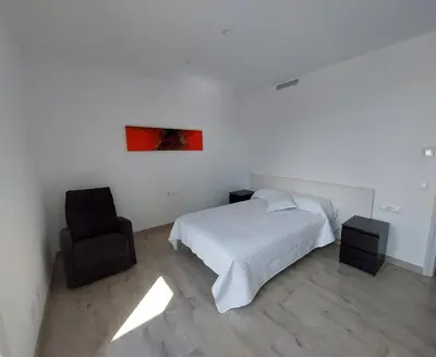 Cama o camas de una habitación en Àtic al centre de Girona