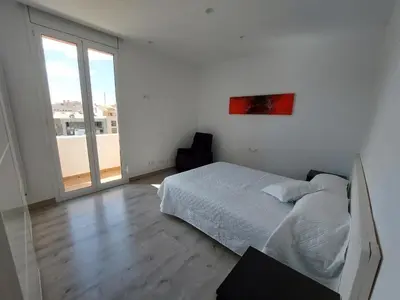 Cama o camas de una habitación en Àtic al centre de Girona