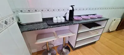 Una cocina o zona de cocina en NEXTHOME Beach & Pool
