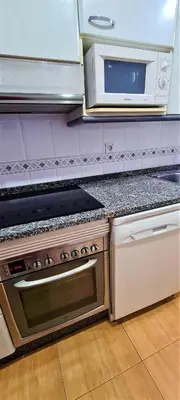 Una cocina o zona de cocina en NEXTHOME Beach & Pool