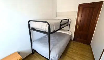 Cama o camas de una habitación en NEXTHOME Beach & Pool