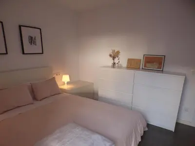 Cama o camas de una habitación en Pis pràctic i agradable sobre la Marina Palamós