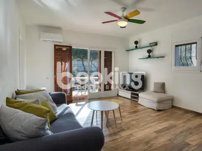 Zona de estar de Mar bella Apartament a dos minuts de la platja amb wifi i parking per 6 persones