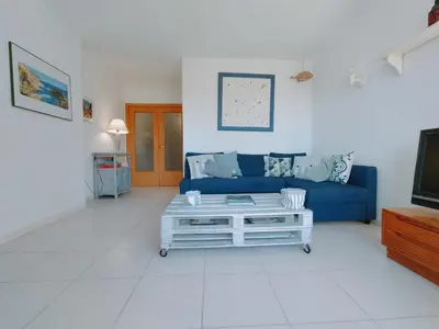 Zona de estar de Precioso apartamento con piscina en Tamariu