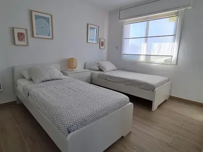 Cama o camas de una habitación en S'Agaró Apartment with sea views and pool