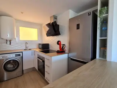 Una cocina o zona de cocina en S'Agaró Apartment with sea views and pool