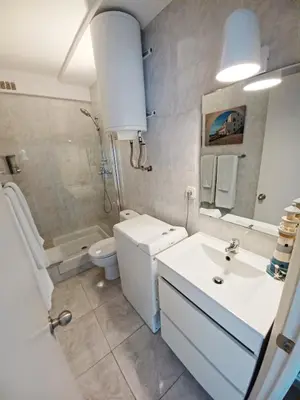 Un baño de Apt con piscina en Calella de Palafrugell, parking gratuito